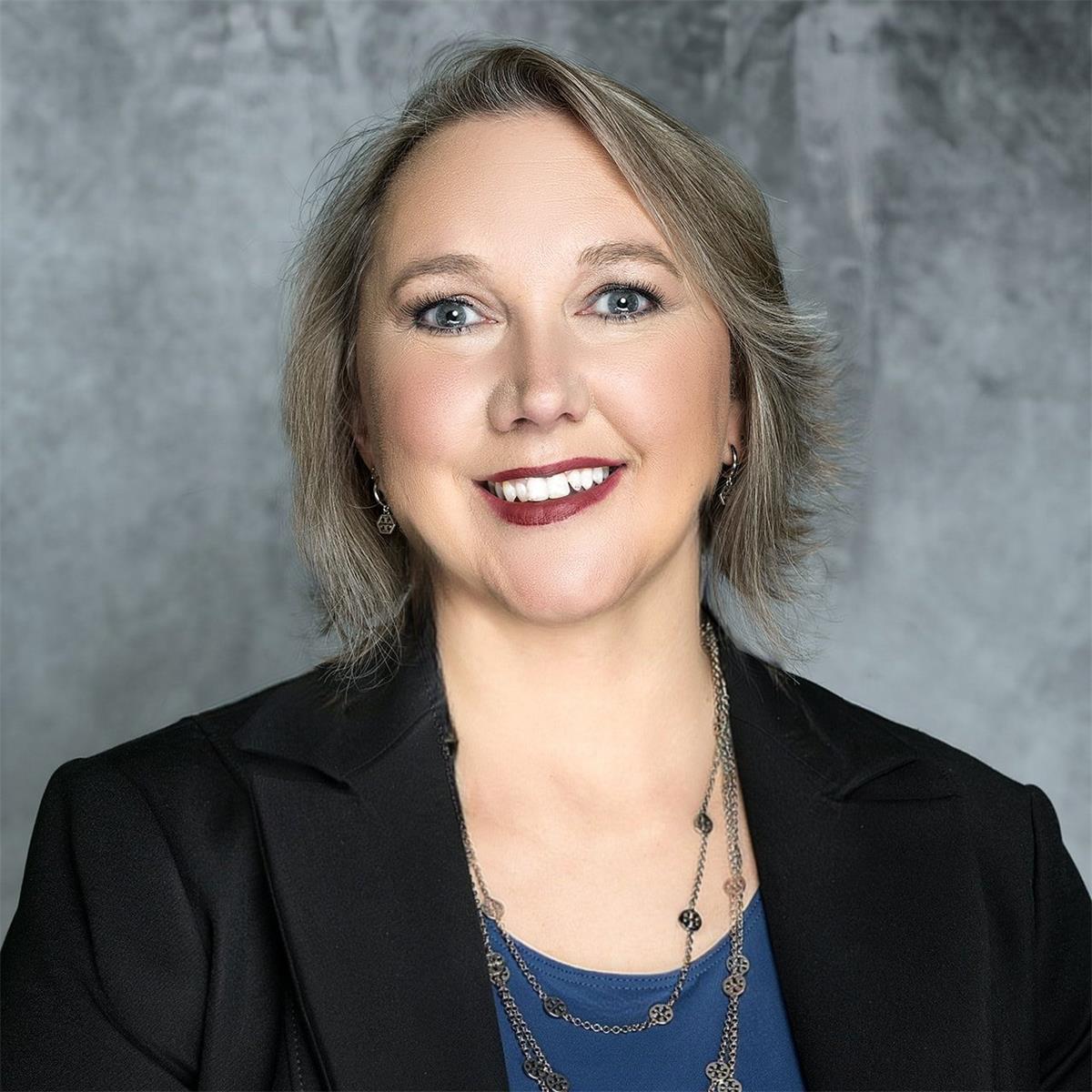 Candy Cole, Executive Director